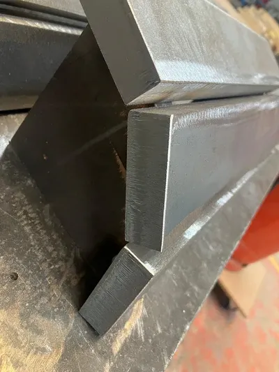 Straight bars ready to be welded into a curved shape